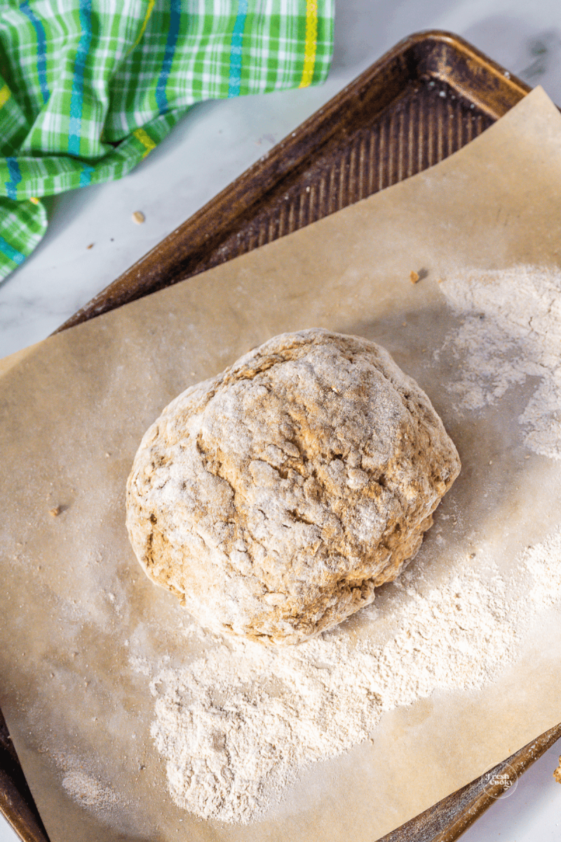 Knead dough with a little flour until smooth and it stays together. 