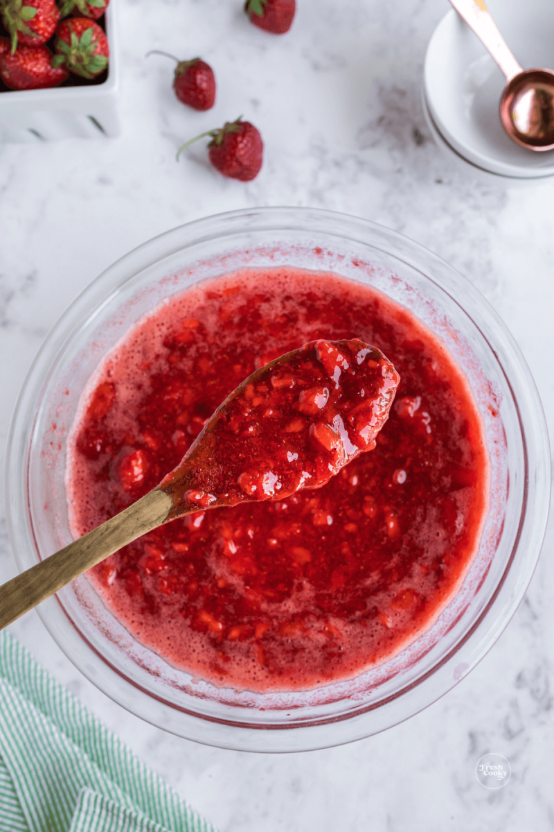 Spoon in freezer jam after stirring for 3 or more minutes.