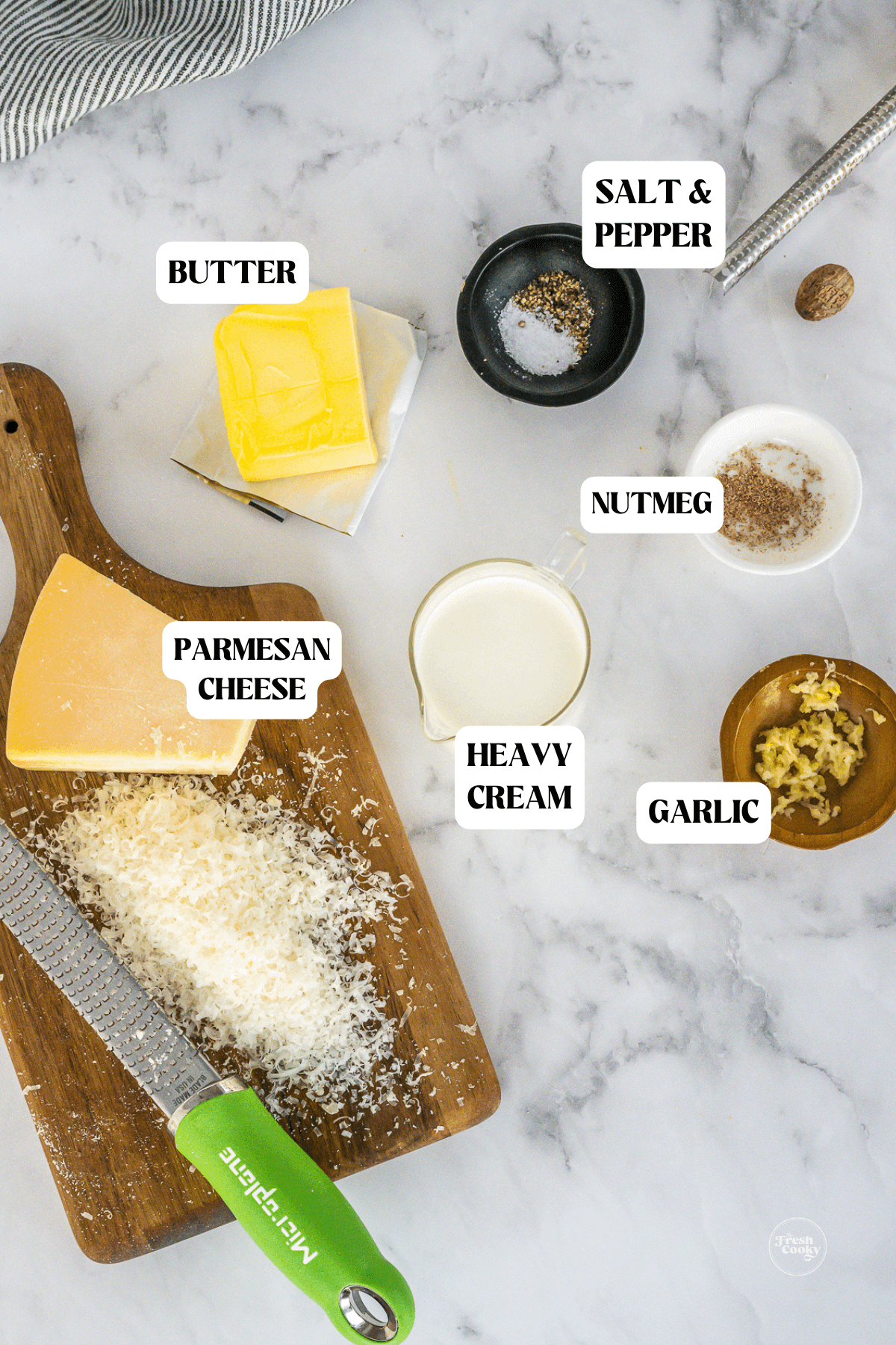 Labeled ingredients for easy alfredo sauce recipe without cream cheese.