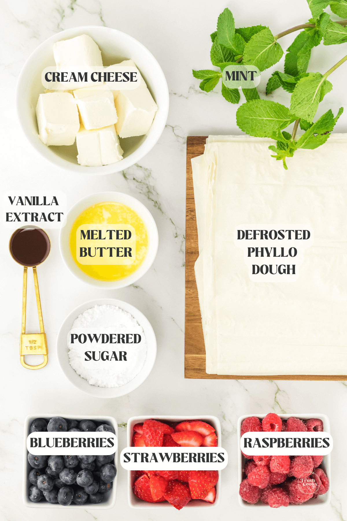 Labeled ingredients for strawberry cheesecake phyllo cups.