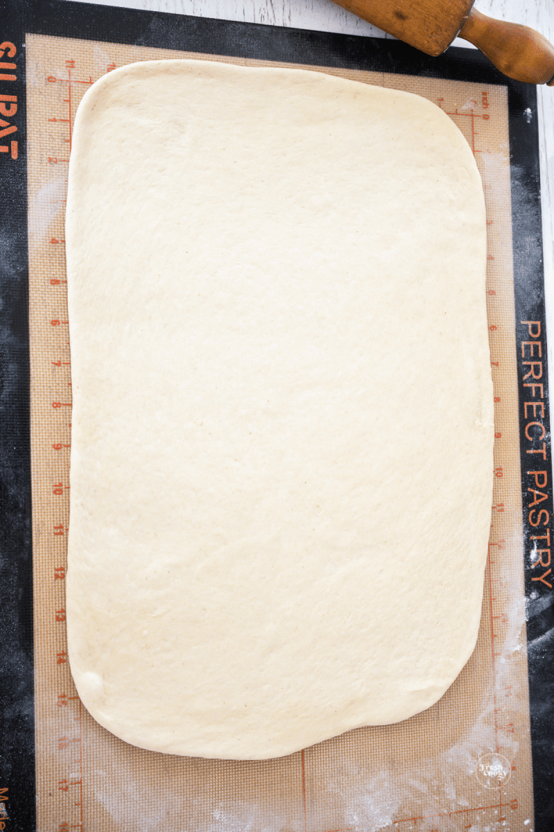 Rolled out pizza dough into large rectangle for stromboli. 