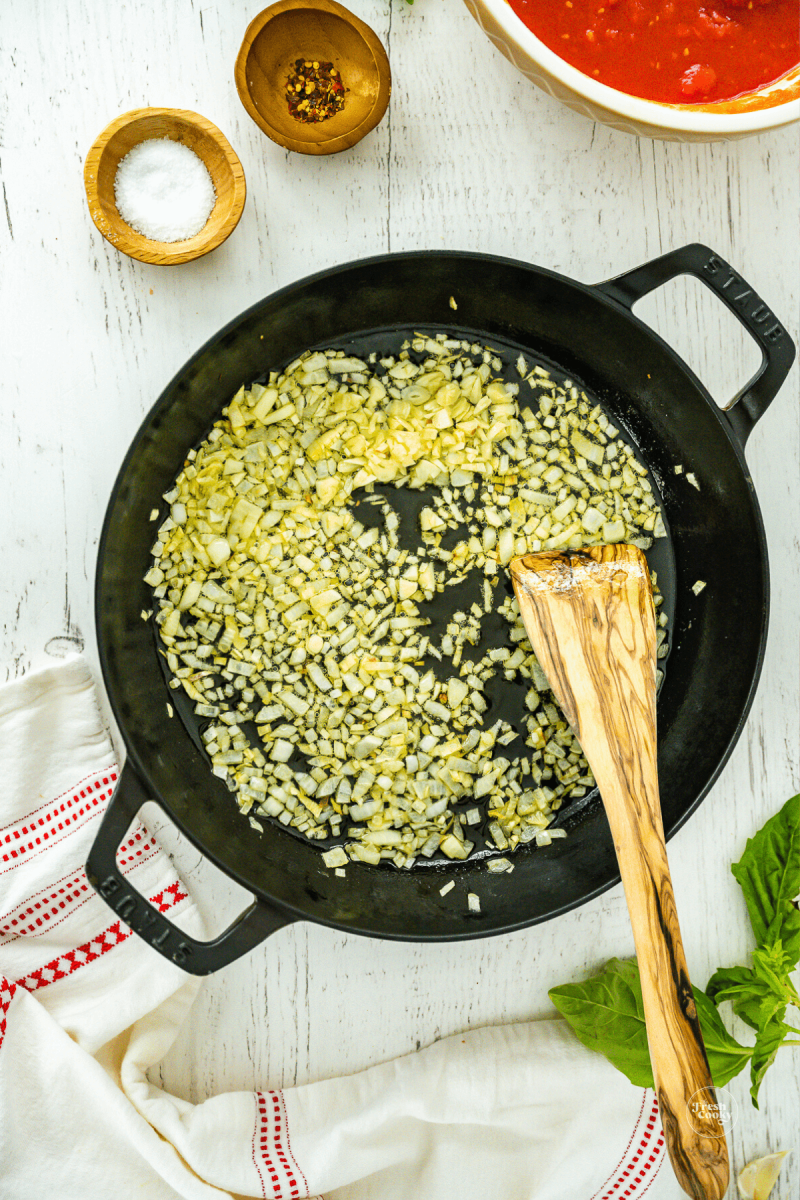 Sautéing onions in olive oil and garlic. 