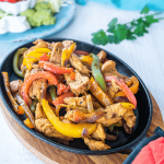 Authentic Mexican fajita recipe on cast iron skillet.