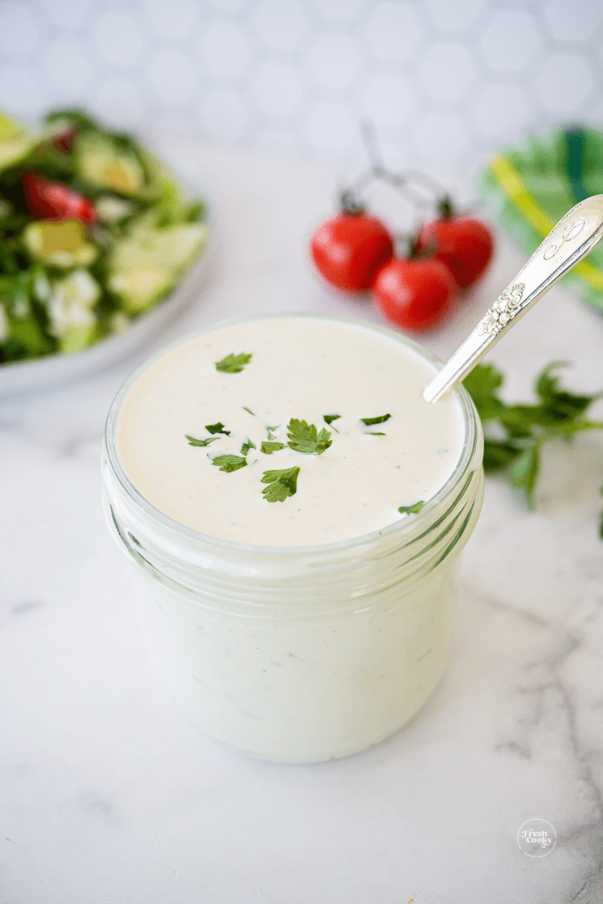Jar of homemade low carb blue cheese dressing.