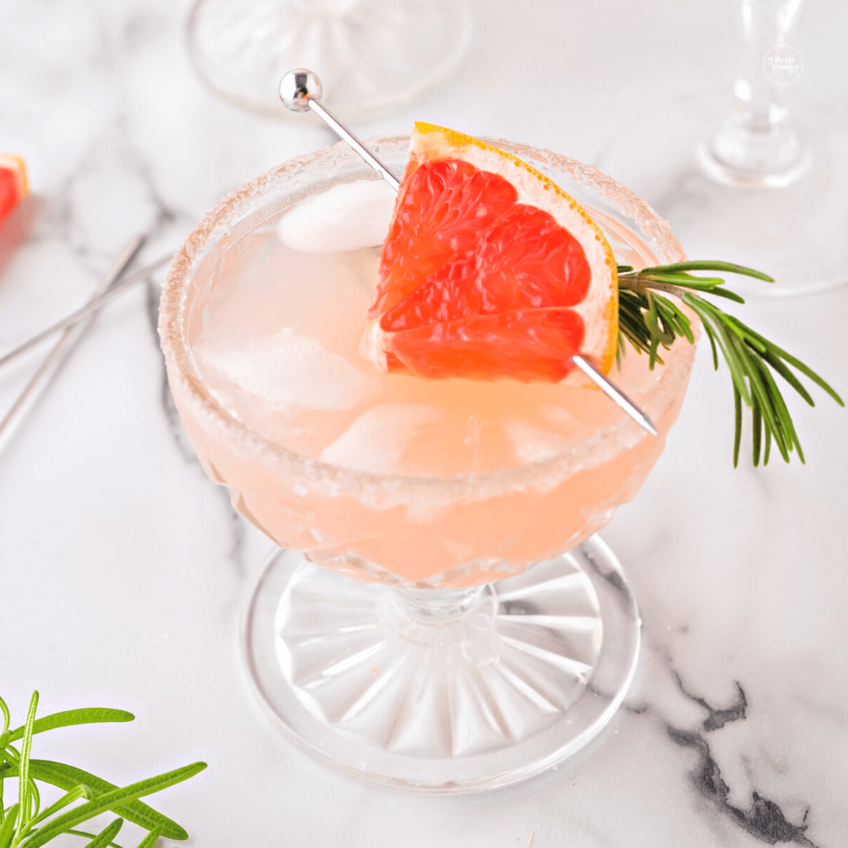 Grapefruit Paloma Spritzer in pretty coupe cocktail glass.