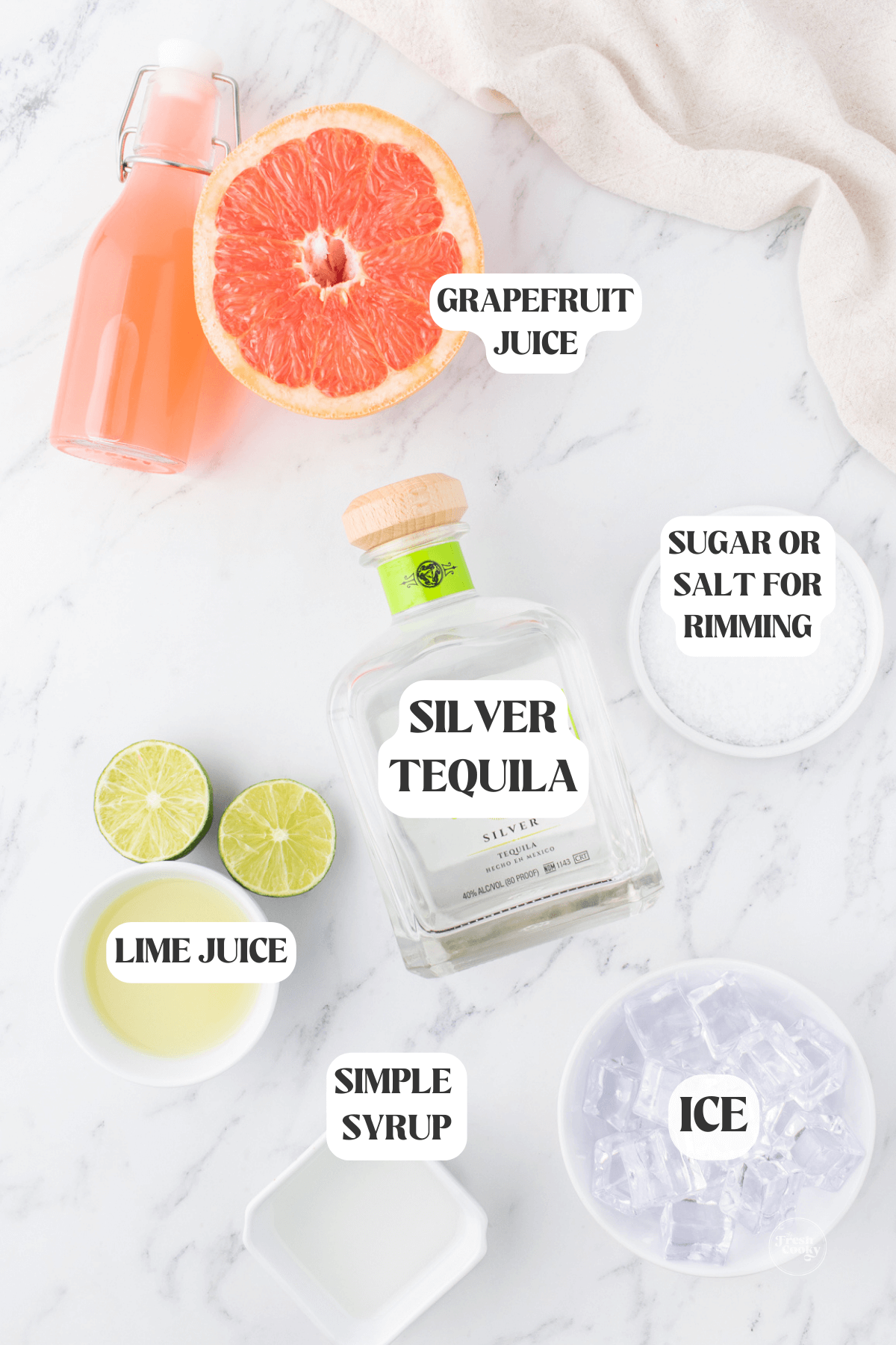 Labeled ingredients for frozen paloma cocktail.