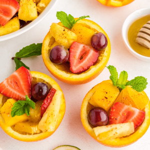 Easy Mexican fruit salad in fruit cups.