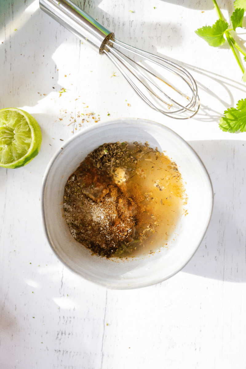 Easy and healthy chicken fajita marinade in bowl. 