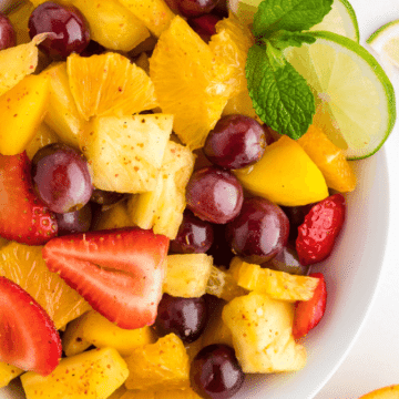 A large serving bowl full of Mexican Fruit Salad