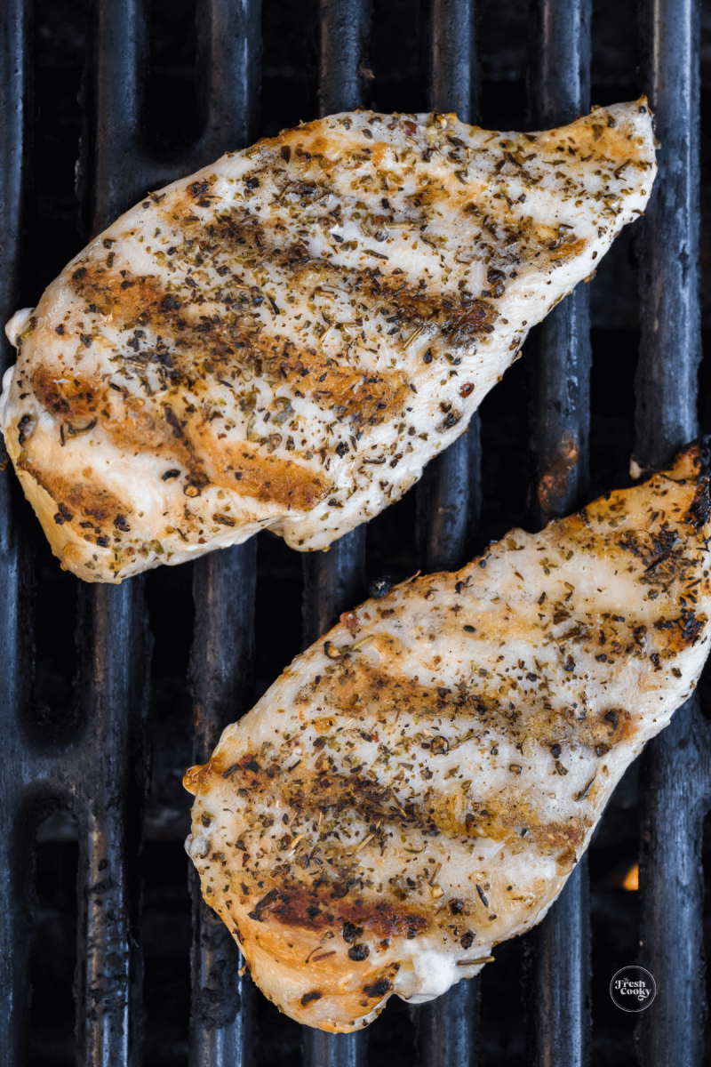 Chicken breasts on grill with grill marks, for green goddess cobb salad. 
