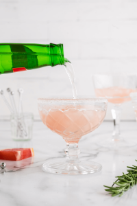 Pour ginger beer to top of glass filled with grapefruit juice.