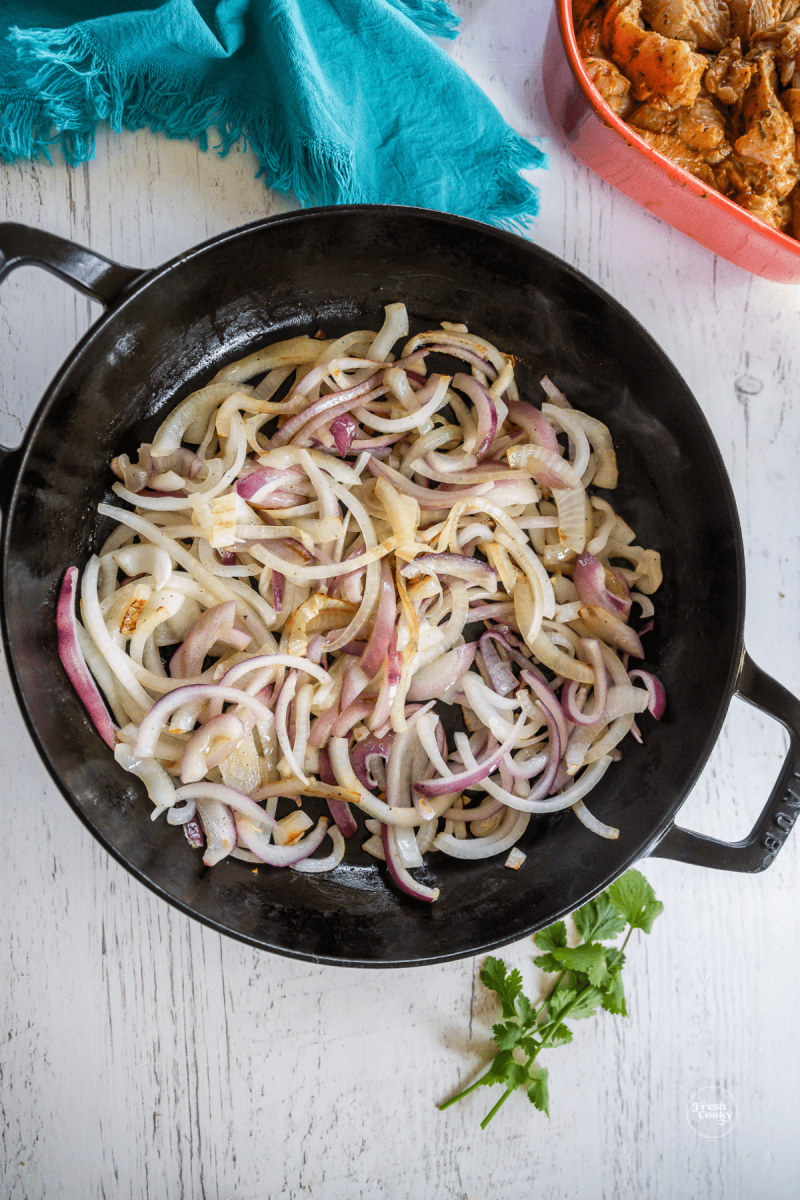 Sautéing sweet and red onions.
