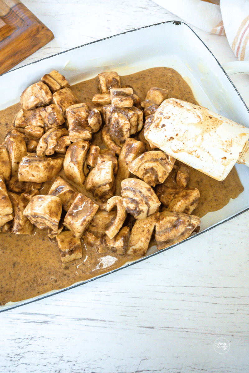Pour casserole into buttered casserole dish.