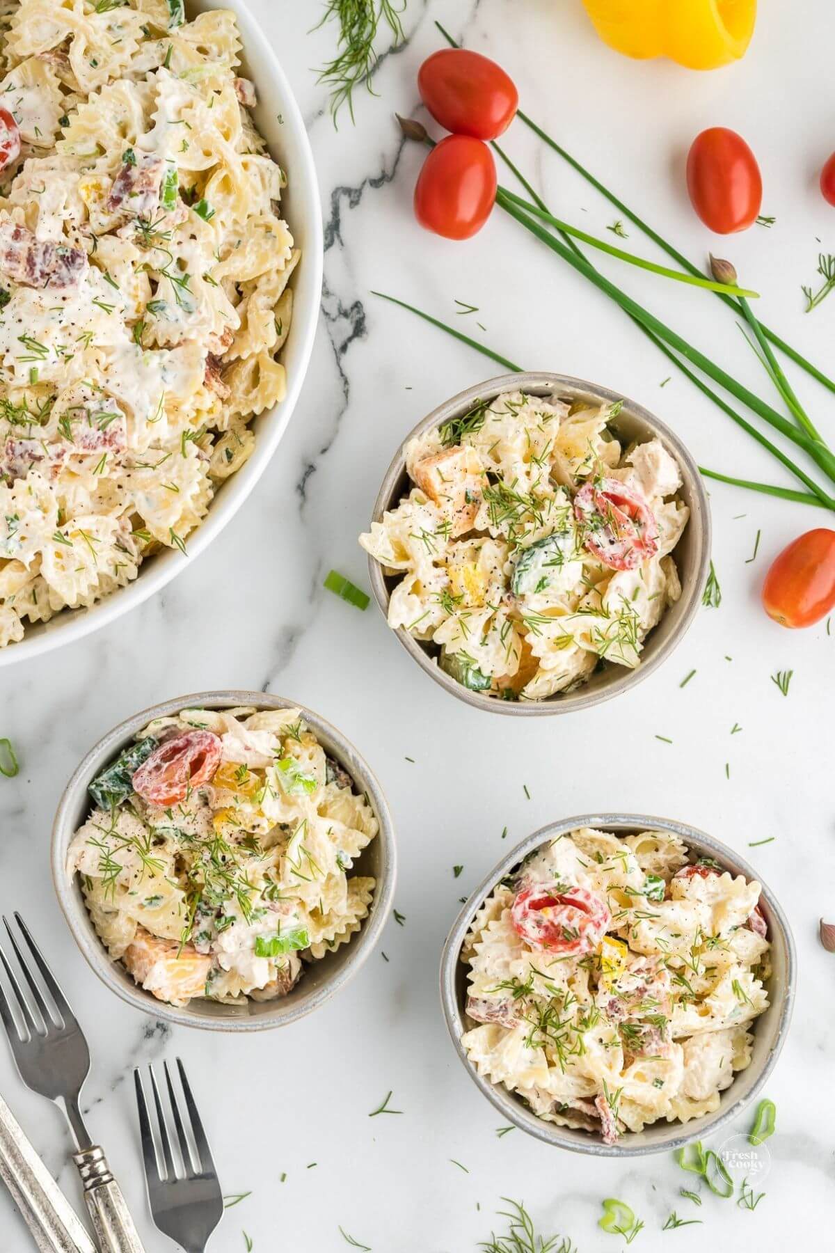 Three servings of chicken bacon ranch pasta salad.