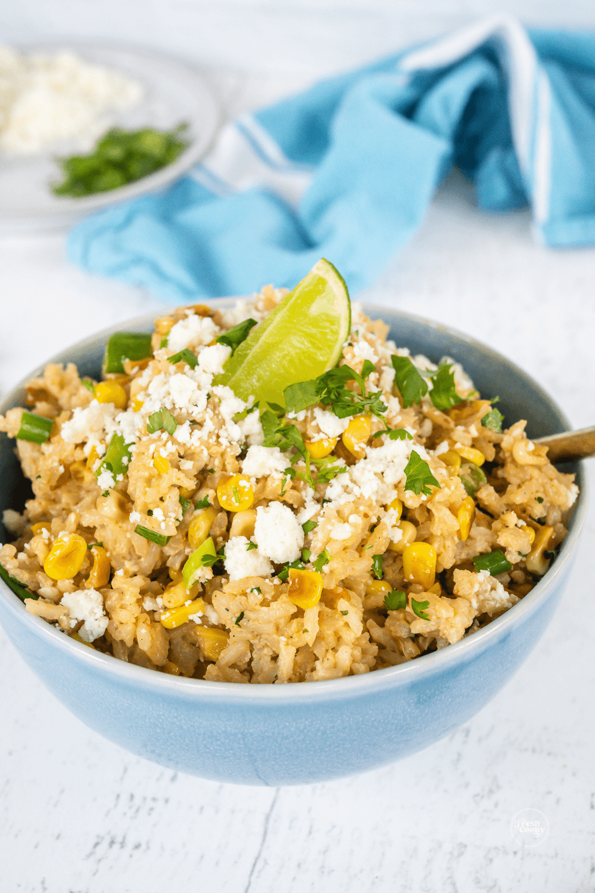 Bowl filled with flavorful Mexican rice and corn.