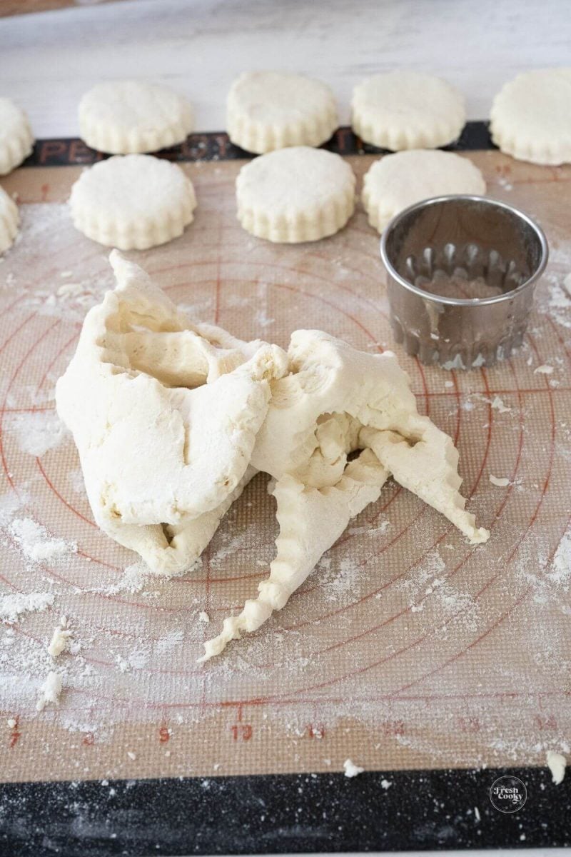 Collect scraps and pat and roll into ½ inch biscuit dough to recut. 