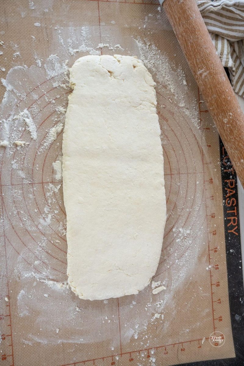 Roll dough into rectangle for biscuits. 