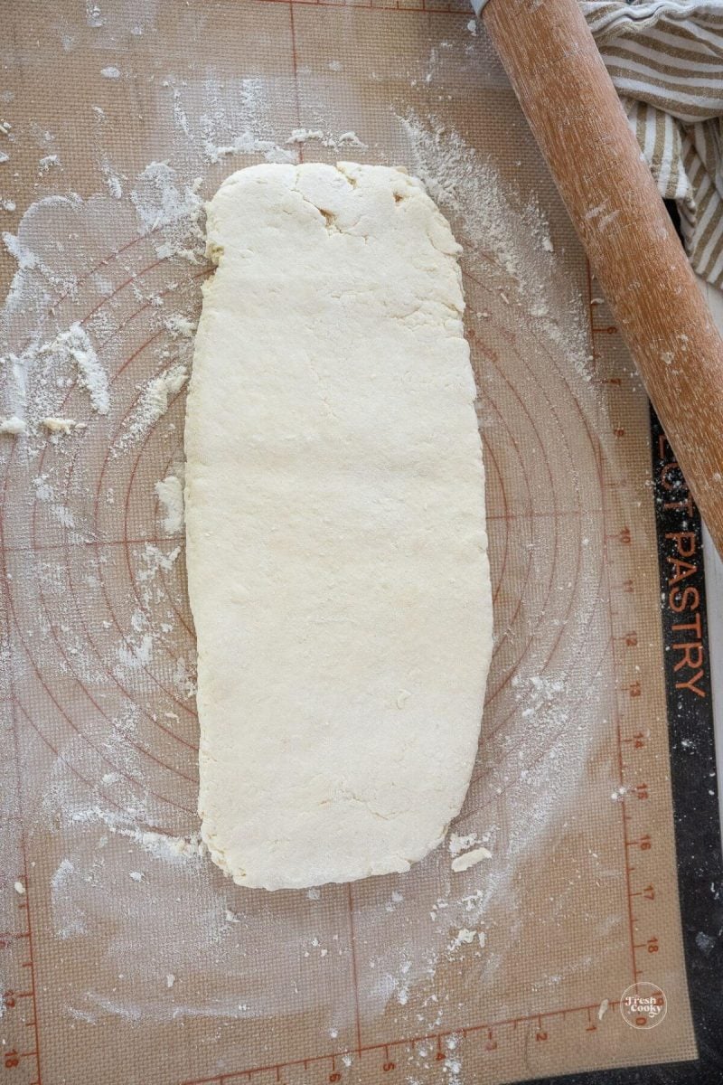 Roll dough into rectangle for biscuits.