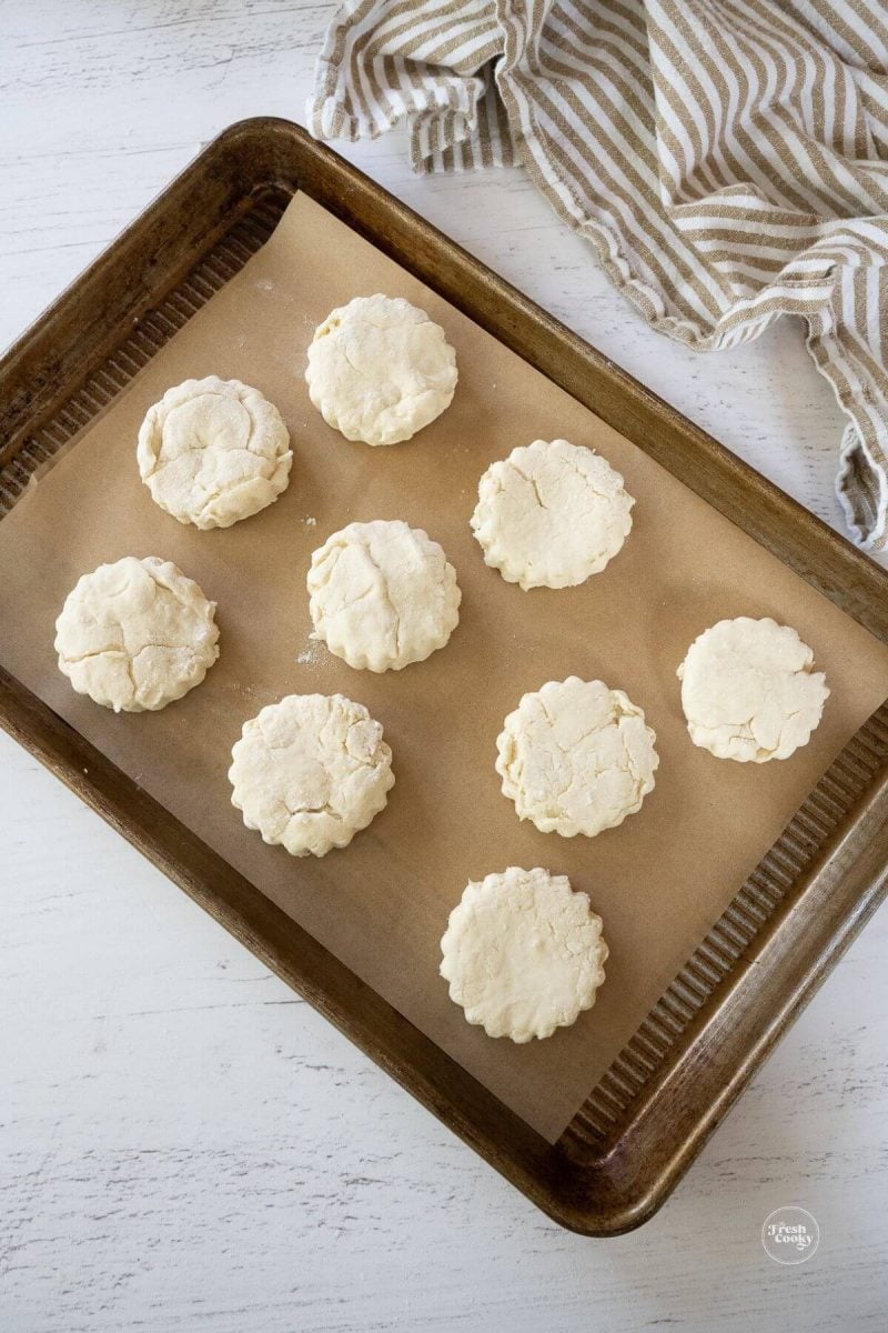 Place biscuits on baking sheet. 