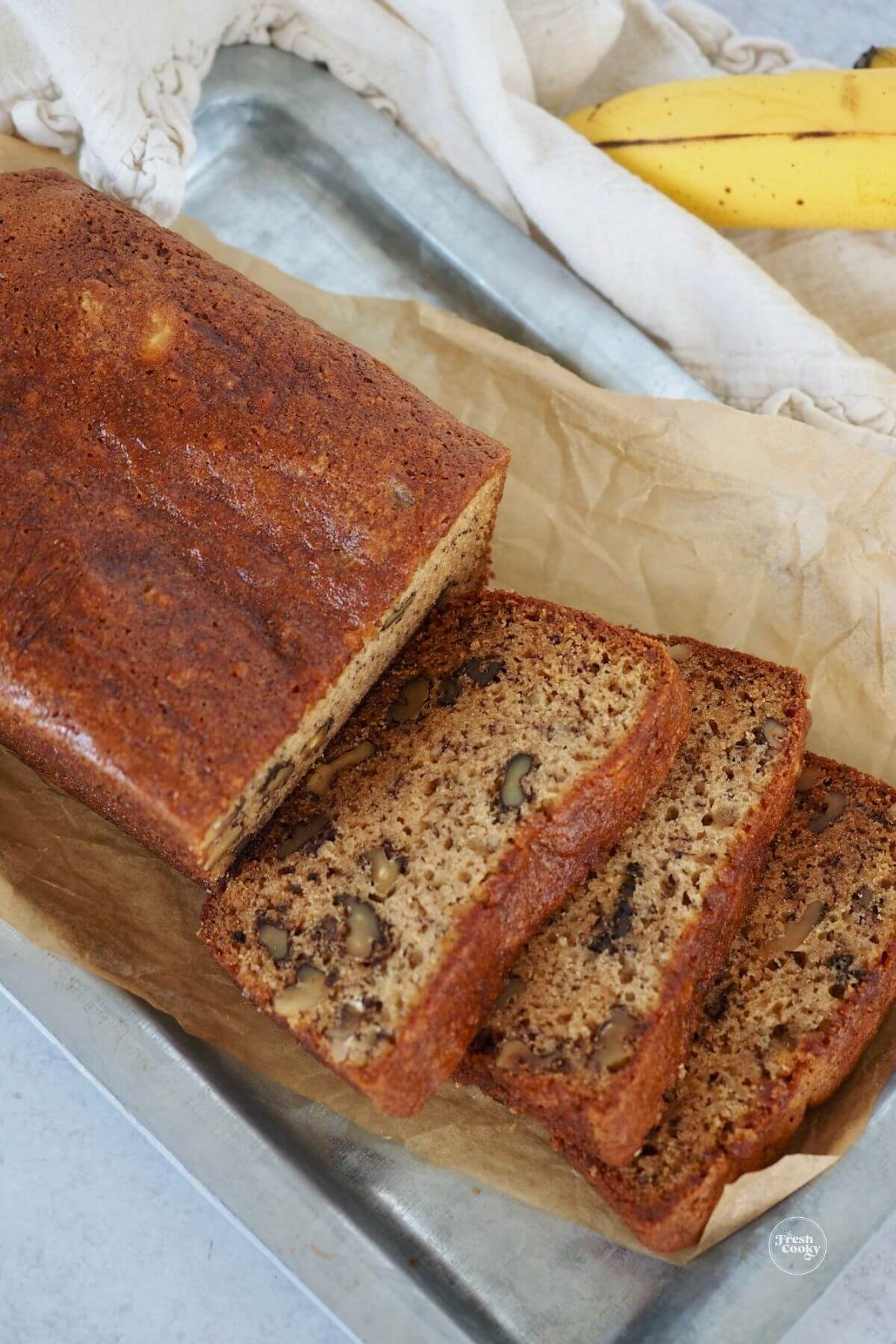 Sliced of high altitude banana bread on a tray.