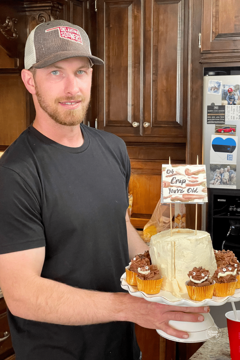 Nephew-in-law with his cake and cupcake creation. 