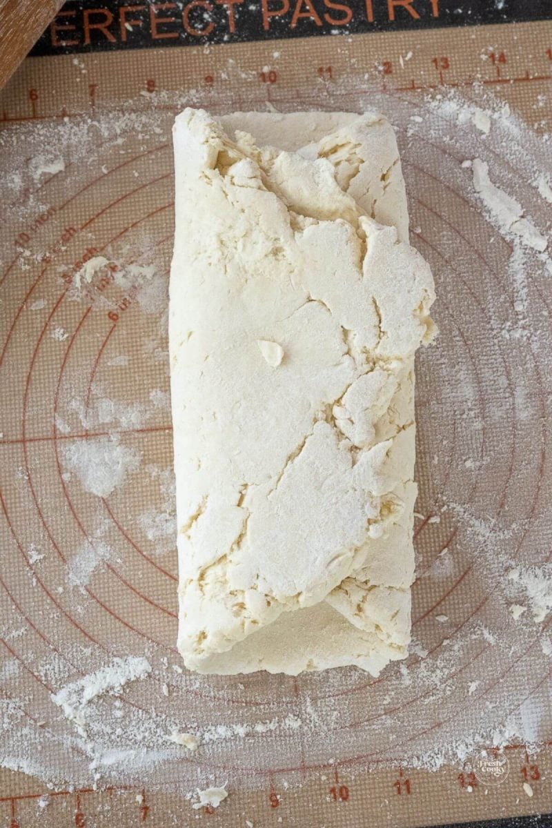 Biscuit dough folded into thirds.