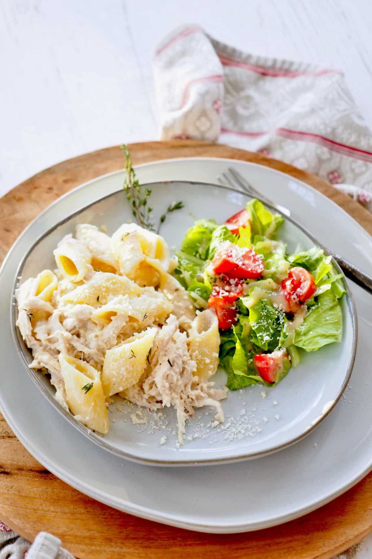 Olive Garden crockpot chicken with side salad.