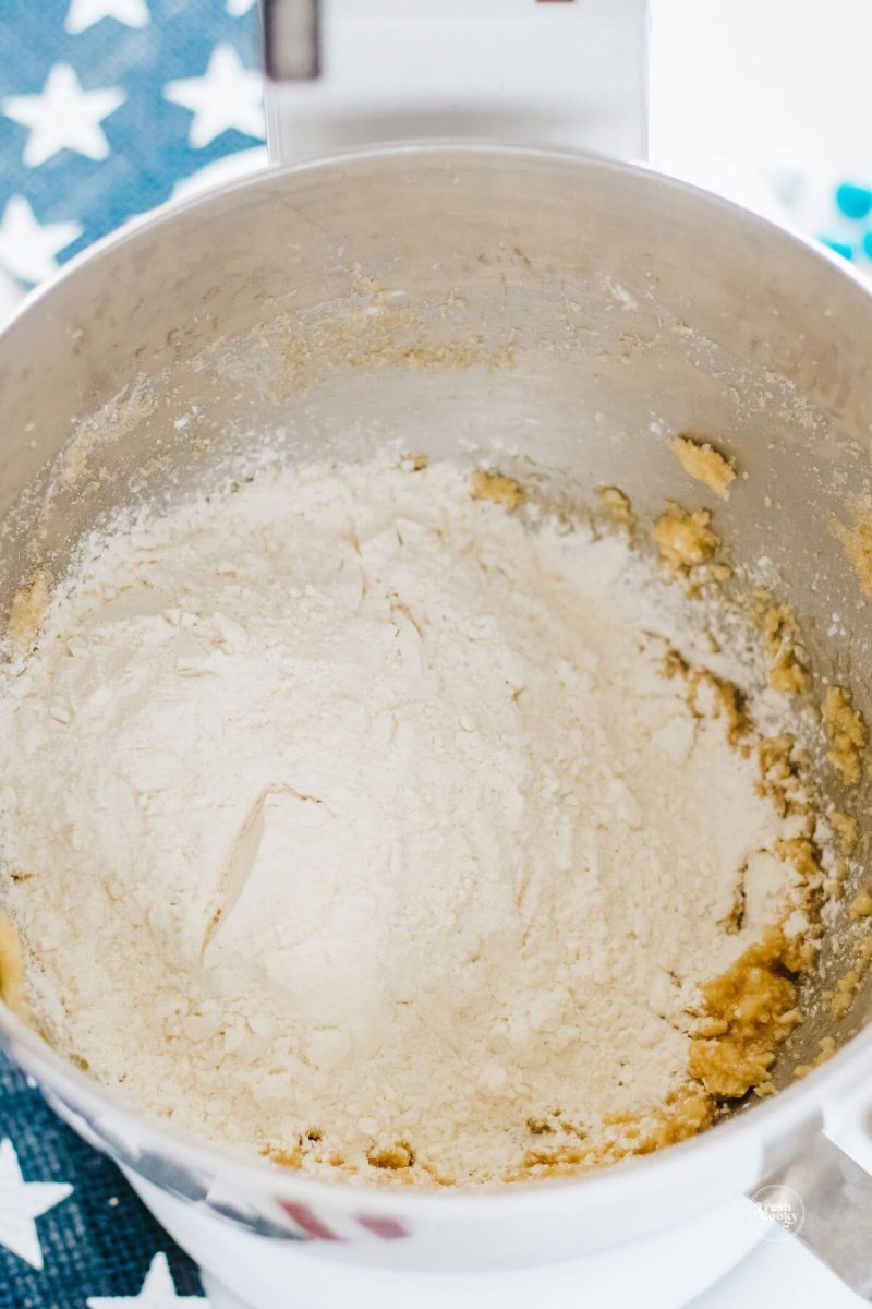Add flour to batter mixture. 