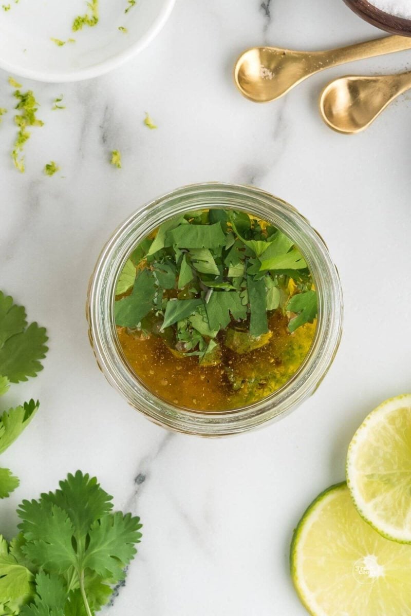 Cilantro and other ingredients in easy honey lime dressing recipe.