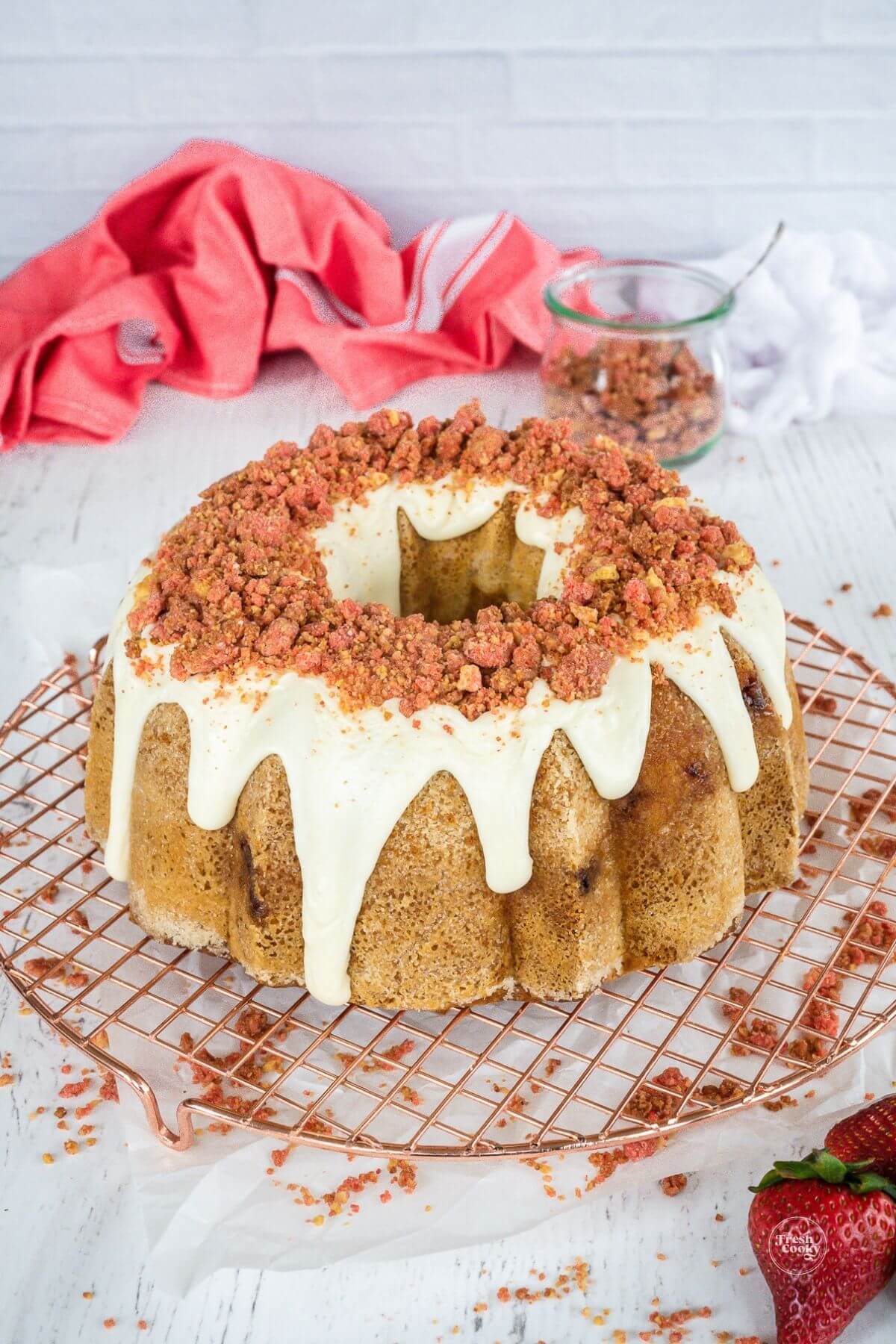 Strawberry Crunch Cake with strawberry crunch topping.