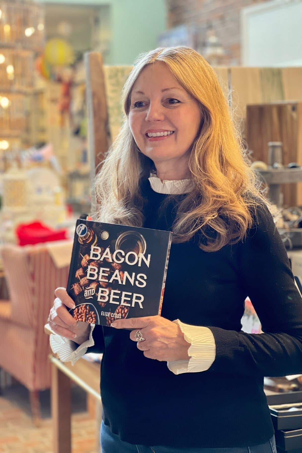 Eliza and a surprise sighting of her bacon beans and beer cookbook in a Tennessee gift shop.
