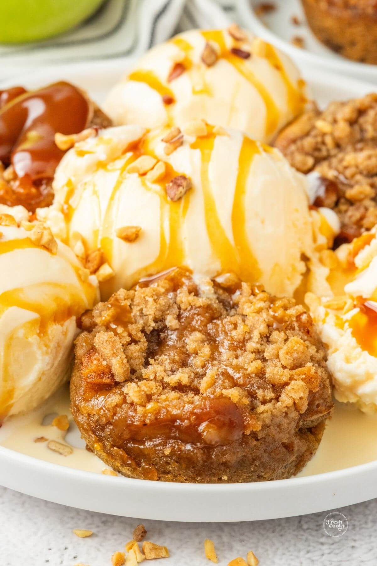 Mini apple pie recipe on plate with vanilla ice cream, ready to serve.
