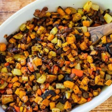 Delicious diced sweet potatoes with bacon and vegetables.