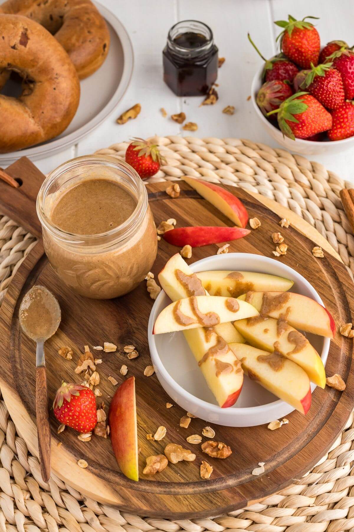 Enjoy granola butter as you would any nut butter, shown here drizzled on apples.