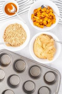 Have all ingredients ready in prepared muffin tins.
