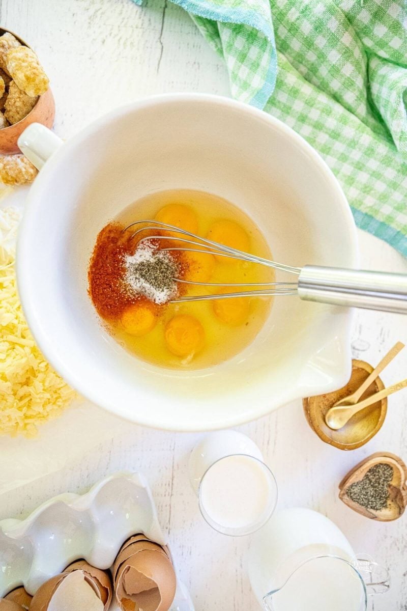 Beat eggs until smooth, then add seasonings. 