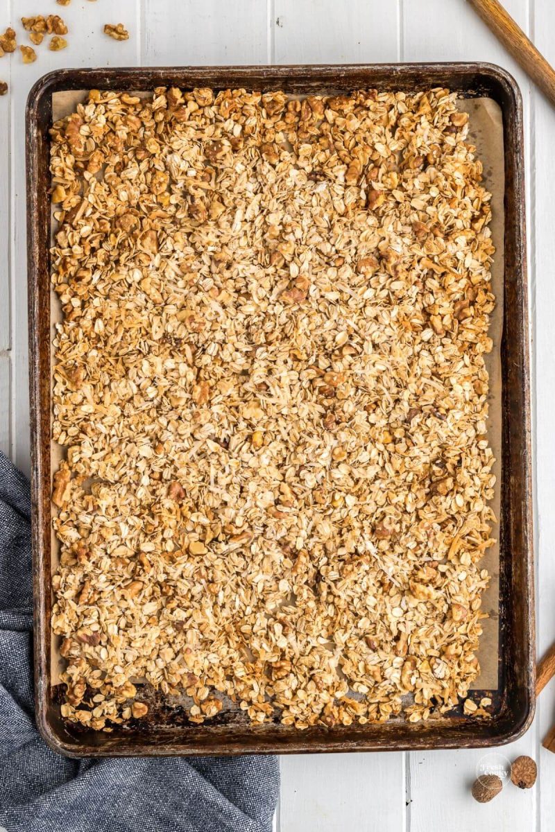 Baked granola on baking sheet.