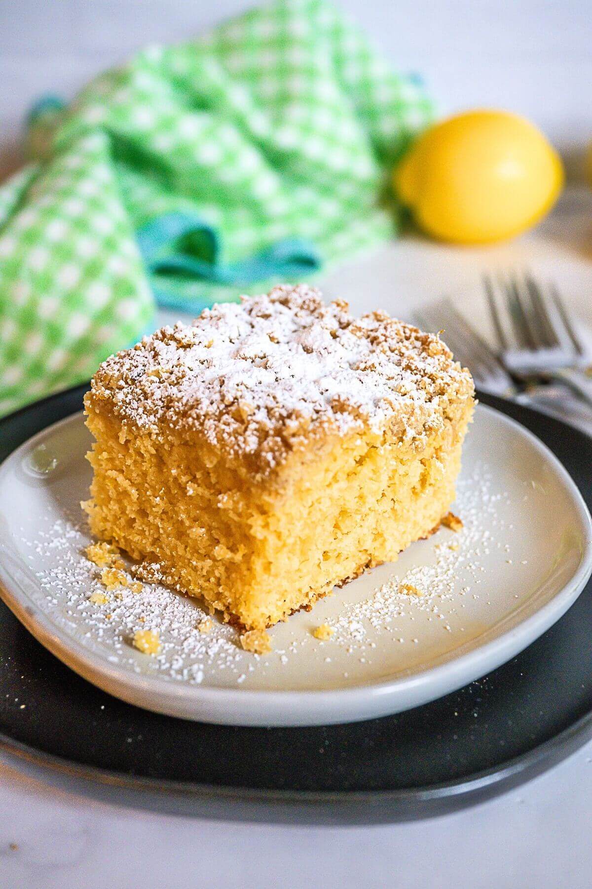 Powdered sugar topped lemon crumb coffee cake. 
