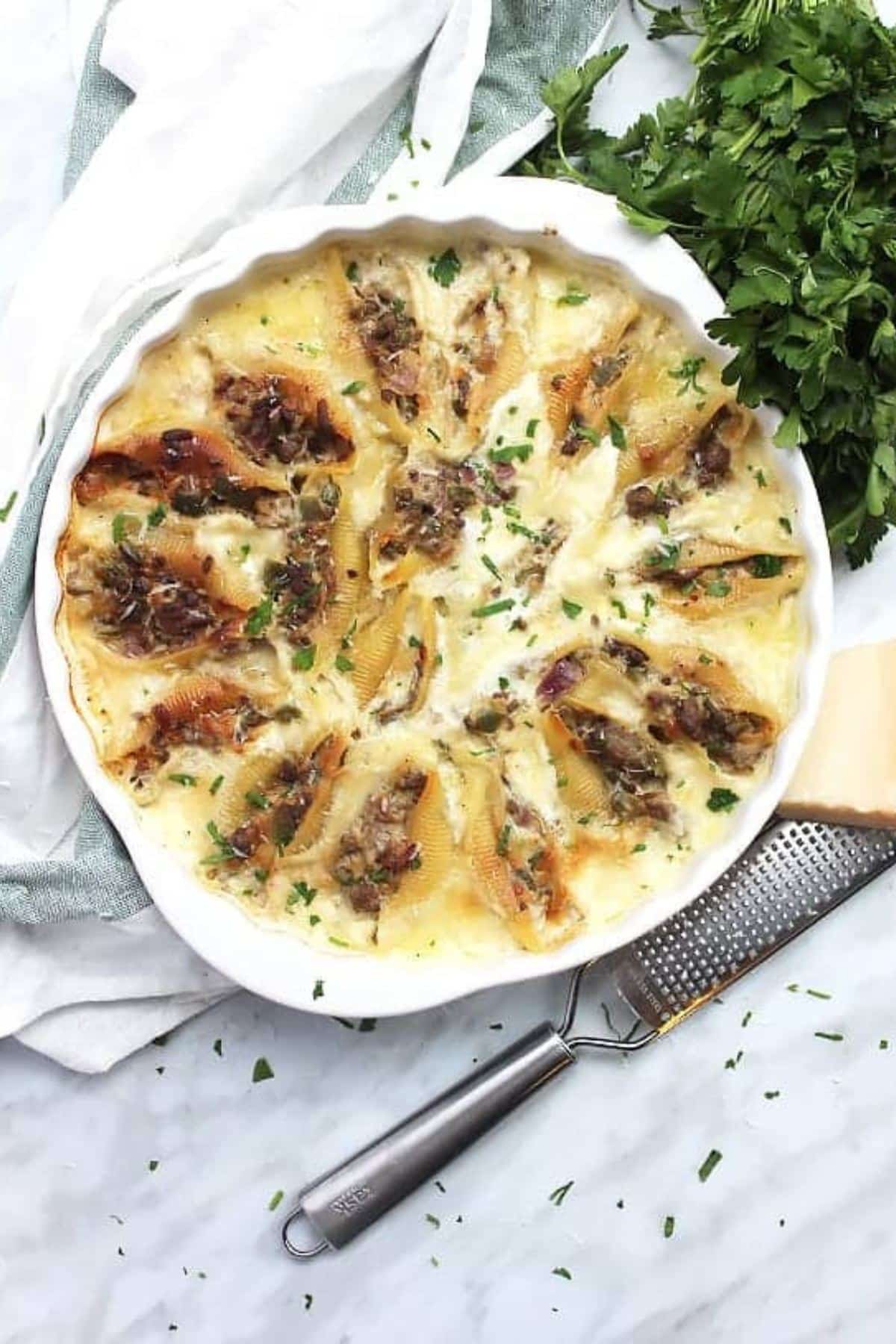 Philly cheesesteak stuffed shells made using shaved steak.