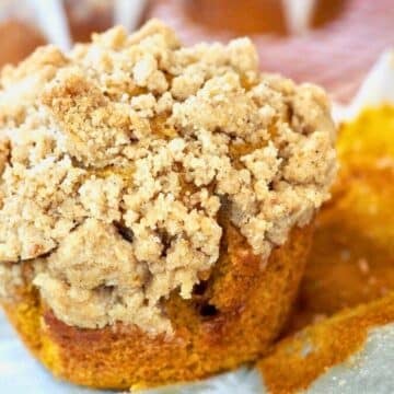 Pumpkin muffin with streusal topping, horizontal.