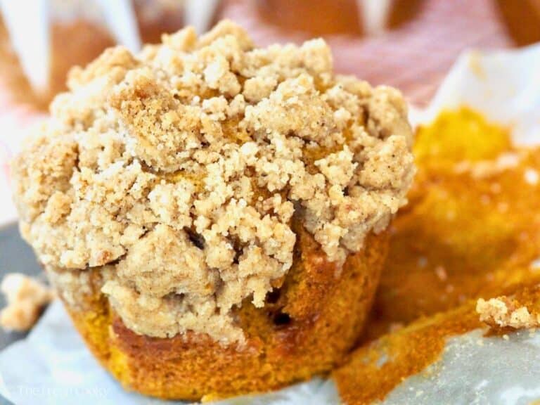 Pumpkin muffin with streusal topping, horizontal.