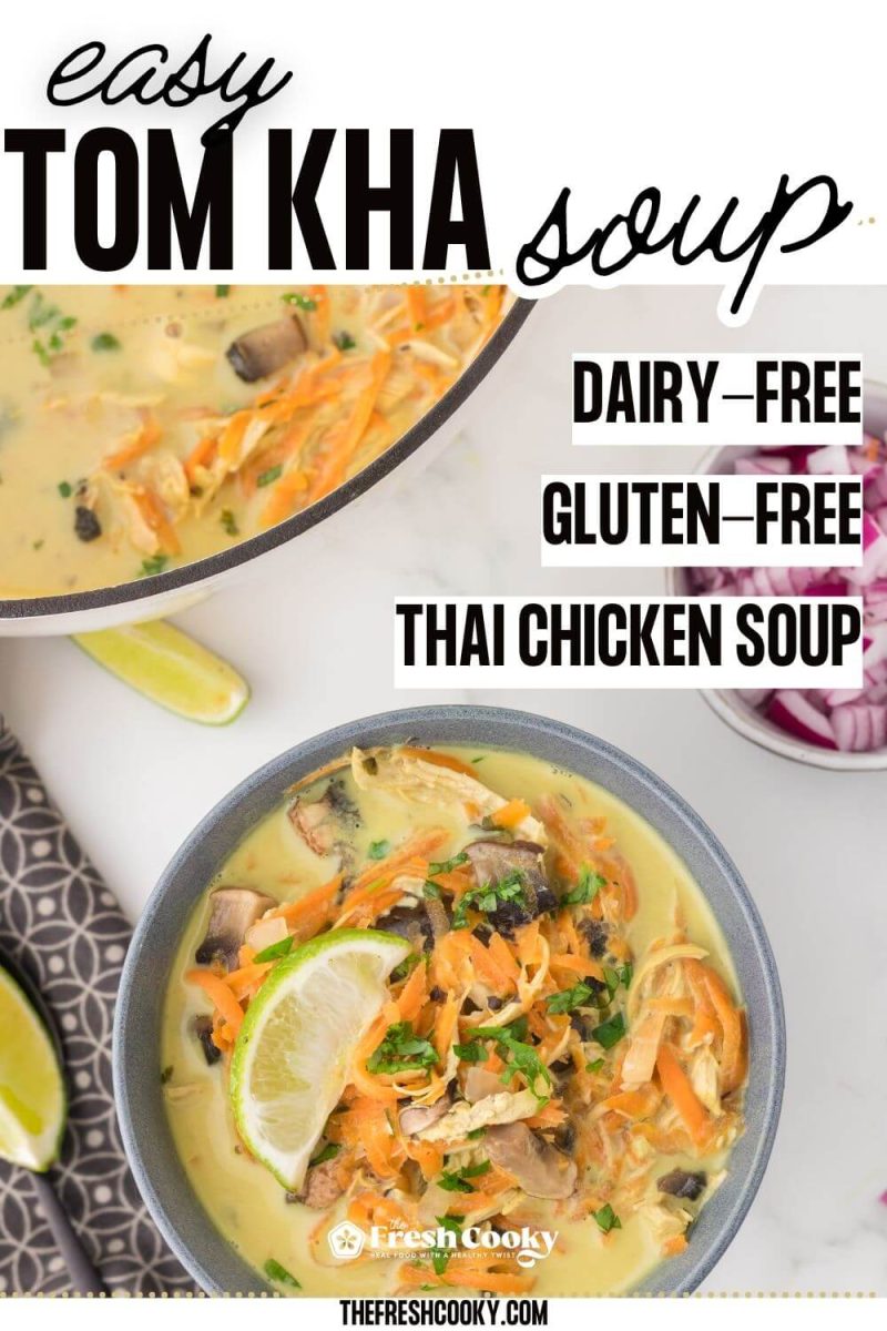A bowl of Tom Kha Soup with soup pot in background. Thai coconut chicken soup, to pin.