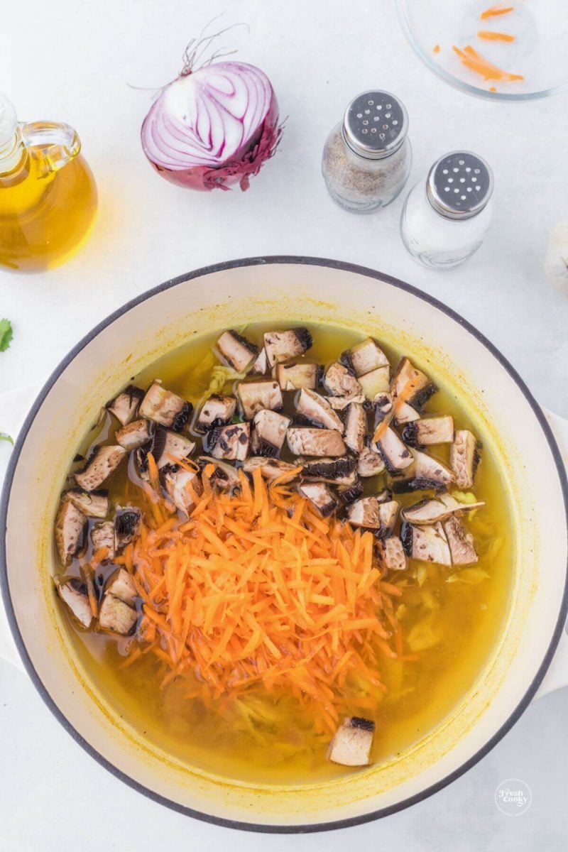 Add carrots and mushrooms.