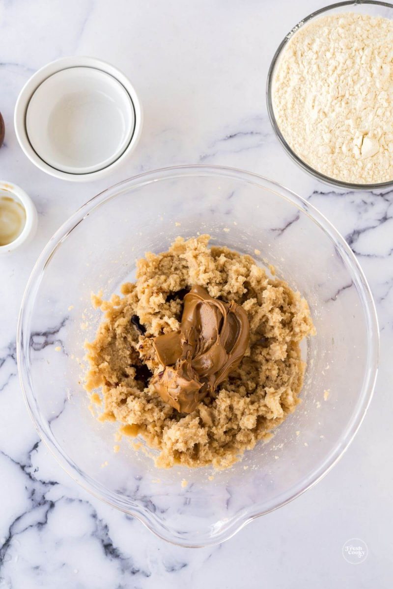 Mix cookie butter into batter.