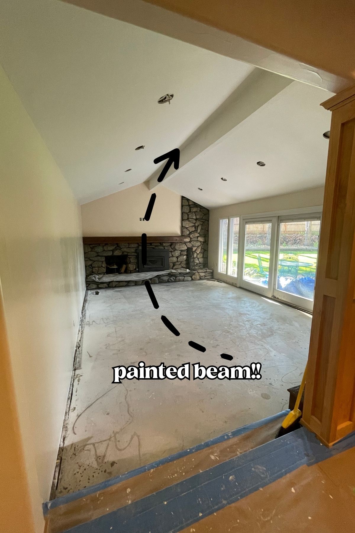Family room with painted beam and walls.
