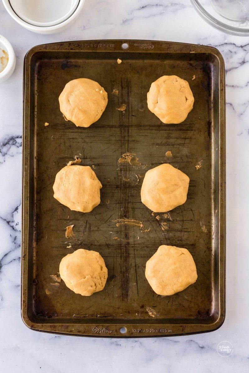 Place cookie dough balls onto cookie sheet. 