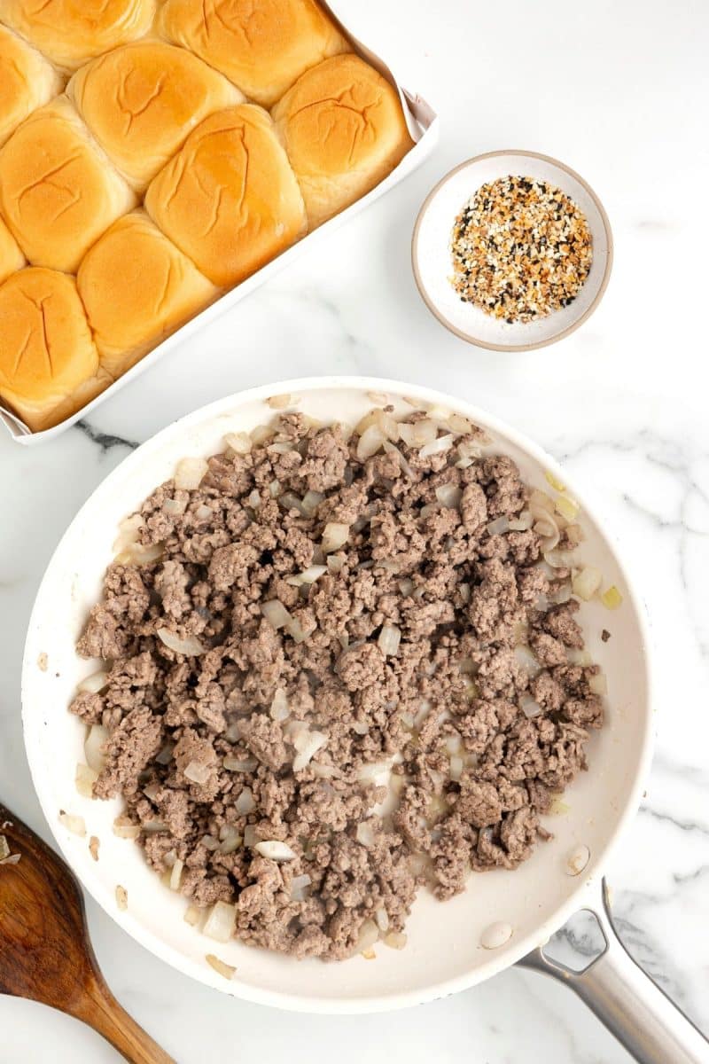 Browning ground beef and onions in pan.