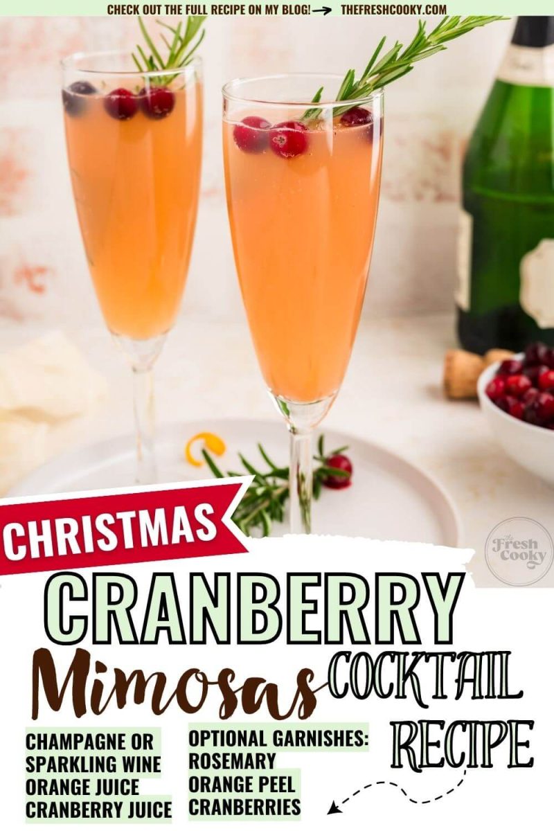 Two glasses of the Christmas Cranberry Mimosas Cocktail next to a champagne bottle, to pin.