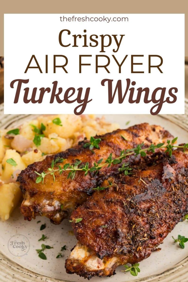 Crispy Air Fryer Turkey Wings on plate with potatoes, to pin.