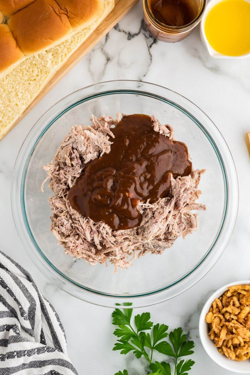 Add the barbecue sauce to the pulled pork and stir to combine. 